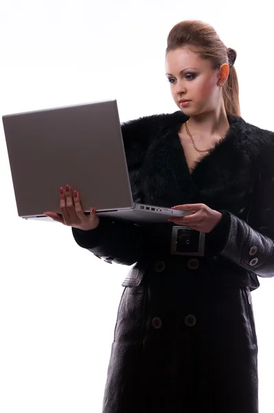 Woman with a laptop on an isolated background — Stock Photo, Image