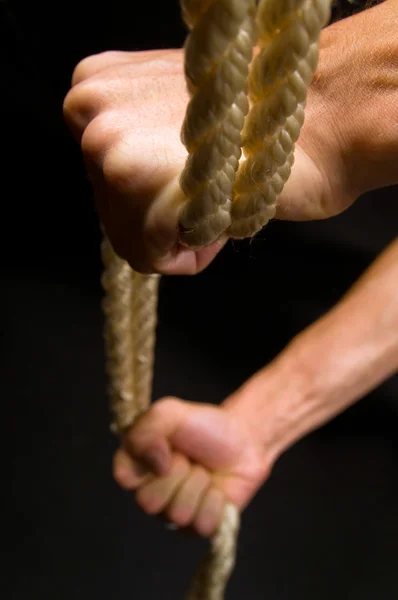 Hände und Seil — Stockfoto