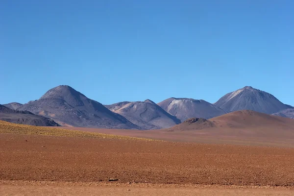 Gamme volcanique dans le désert d'Atacama, Chili Photo De Stock