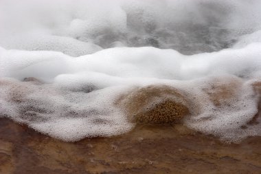 Boiling water in geyser hole, Chile clipart