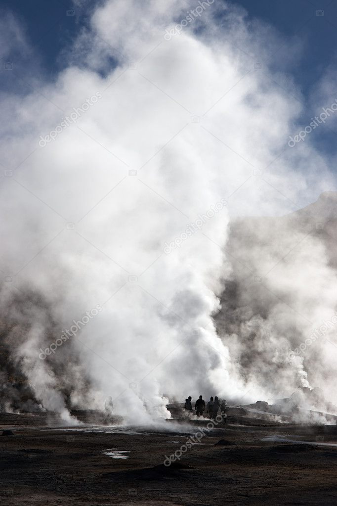 Tourists near erupting geyser, Chile