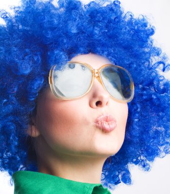 Happy woman in blue wig in Sunglasses clipart