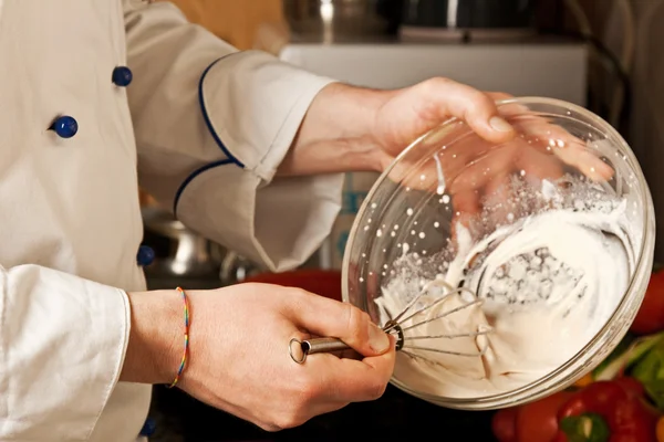 stock image Man whisk cream in a glass