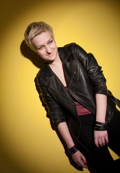 Smiling woman in leather jacket — Stock Photo, Image