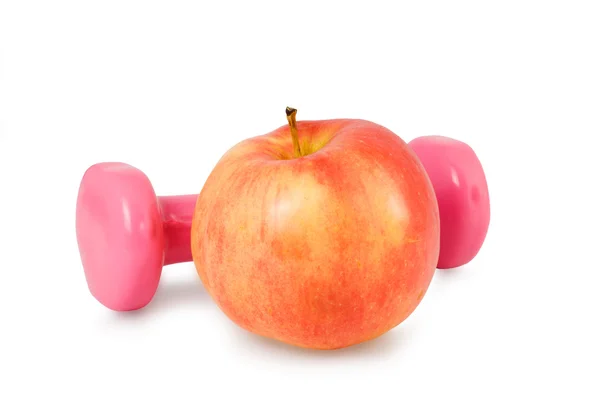 Pembe dumbbell ve Kırmızı elma — Stok fotoğraf