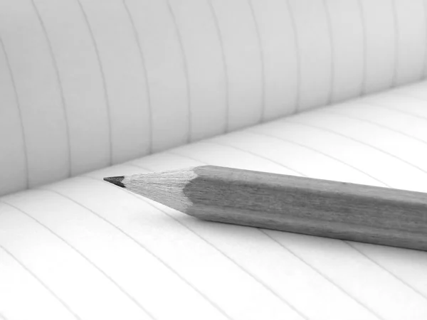 Pencil and workbook — Stock Photo, Image