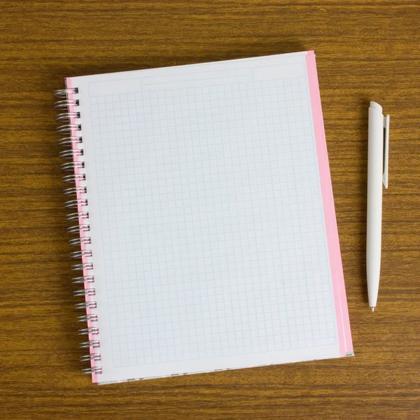 Stock image Notebook and pen