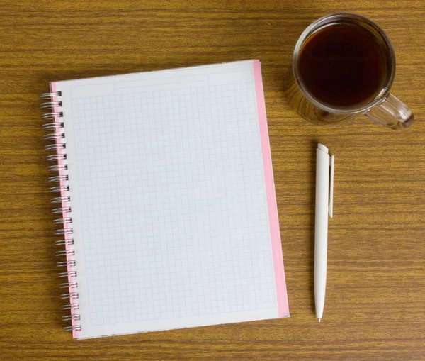 Cuaderno y una taza de café —  Fotos de Stock