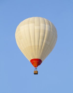 Balloon against a backdrop of blue sky clipart