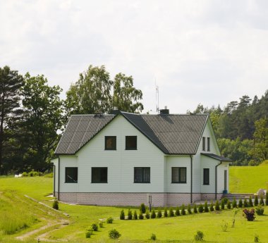 House, lawn, blue sky clipart