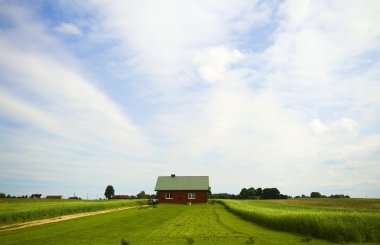 Country house in the middle of fields clipart