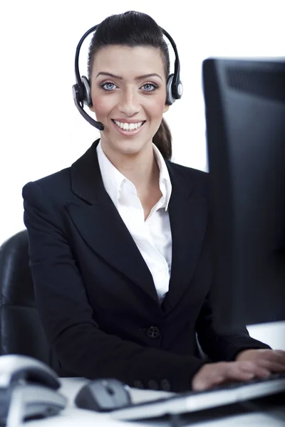 Recepcionista en el trabajo con auriculares — Foto de Stock