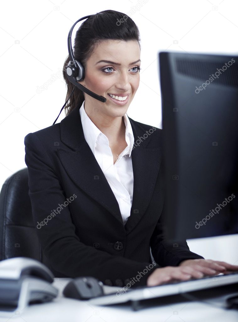 Woman wearing headset in computer