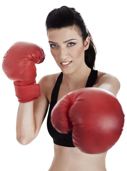 Mujer boxeadora dando un puñetazo —  Fotos de Stock