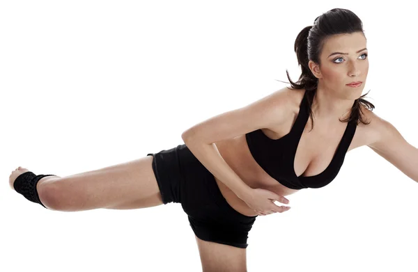 Kobieta robi fitness ćwiczenia w domu — Zdjęcie stockowe