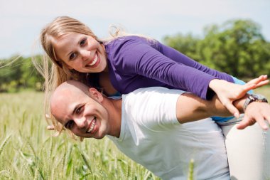 Happy couple enjoying with their arms clipart