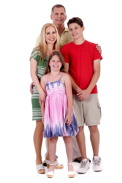 Šťastná rodina ze čtyř standind a při pohledu na vás — Stock fotografie