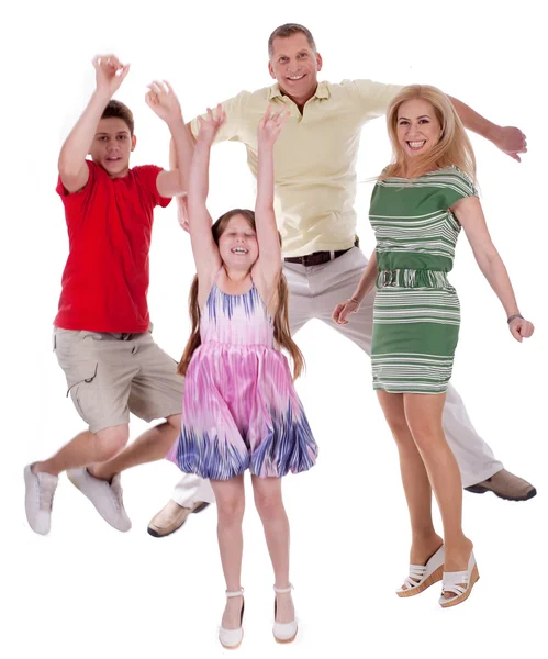 Веселая семья прыгает в воздух и веселится — стоковое фото