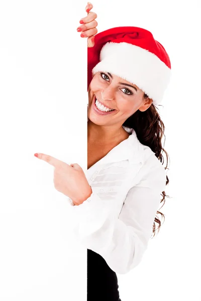 Santa girl pointing the white board — Stock Photo, Image