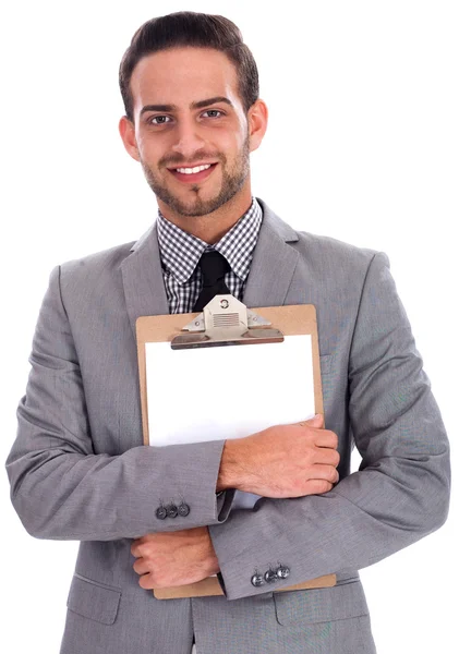 Giovane uomo d'affari in possesso di una clip board — Foto Stock