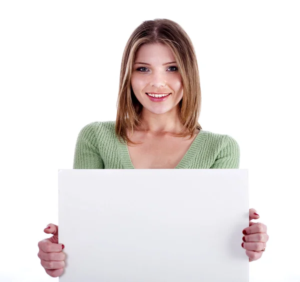 Okouzlující mladá dívka drží bílý bill board — Stock fotografie