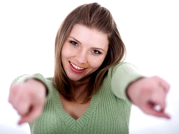 Sorridente giovane femmina che indica attraverso entrambe le mani — Foto Stock