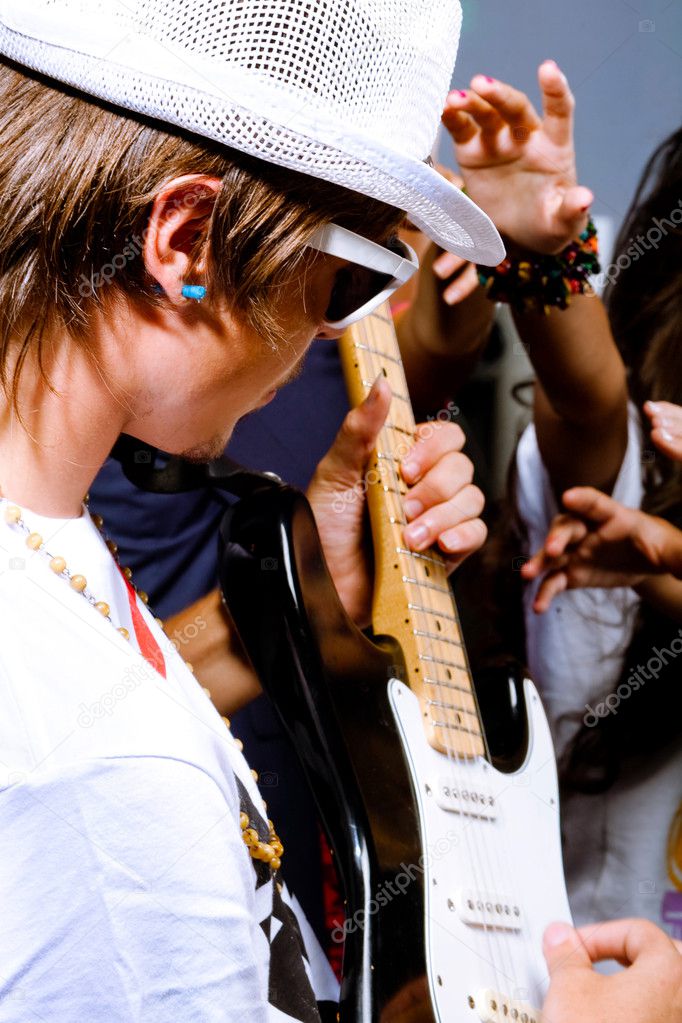 Guitarist performing for his adoring fans