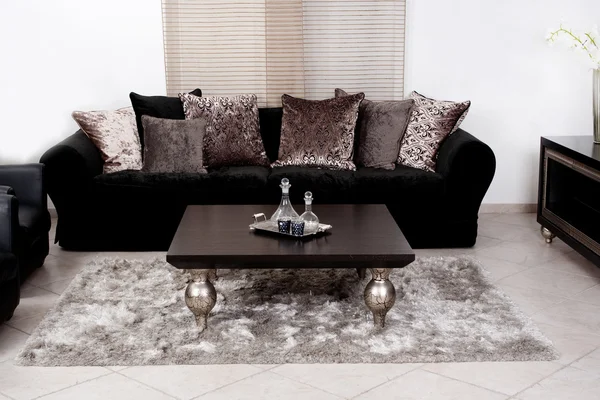 Modern black coloured fabric couch — Stockfoto
