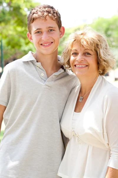 Image of Portrait of a happy senior woman with grandson — Stock Photo, Image