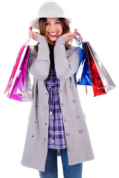 Mutlu kadın alışveriş torbaları ile poz — Stok fotoğraf