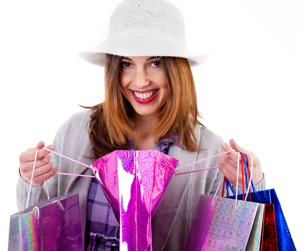 Mulher mostrando seus sacos de compras — Fotografia de Stock