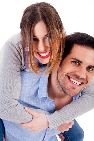 젊은 남자가 그녀의 여자 친구에 게 piggyride — 스톡 사진