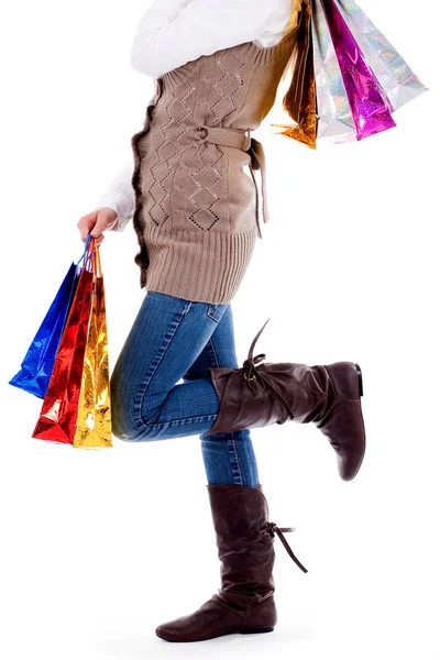 Dame permanent met shopping tassen — Stockfoto