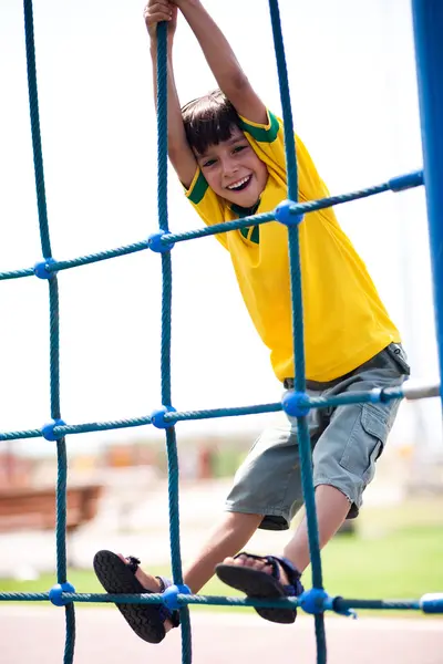 Young kid on playstructure — Stock Photo, Image