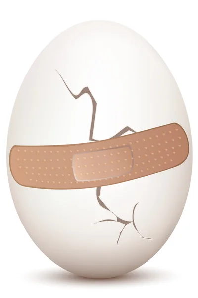 Uovo incrinato con benda — Foto Stock