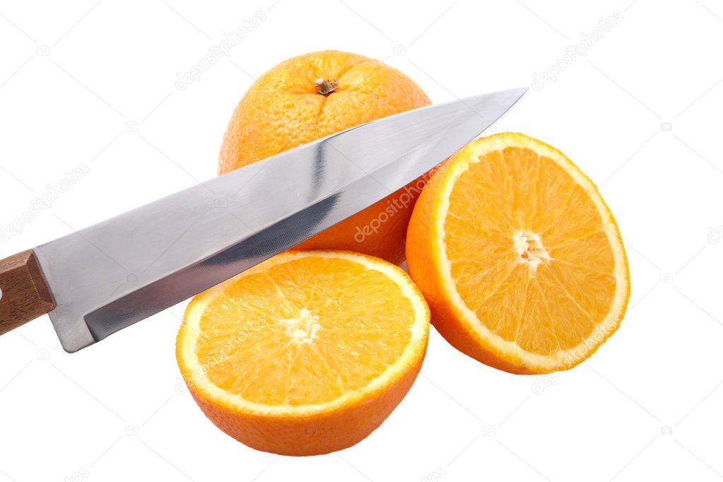 Knife and orange cut half-and-half