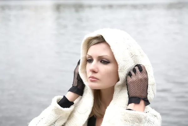 stock image The thoughtful girl in knitted dress