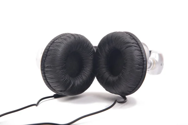 Stříbrná černá sluchátka — Stock fotografie