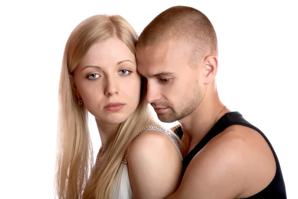 Young man embraces the girl — Stock Photo, Image