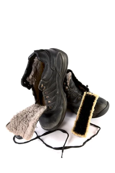 Bota velha com escova de sapato — Fotografia de Stock