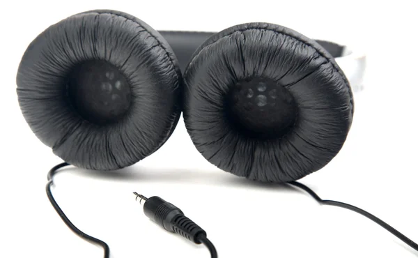 Серебристо-чёрные наушники — стоковое фото
