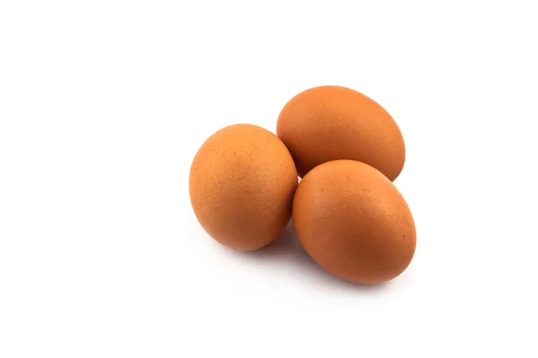 Tres huevos marrones — Foto de Stock