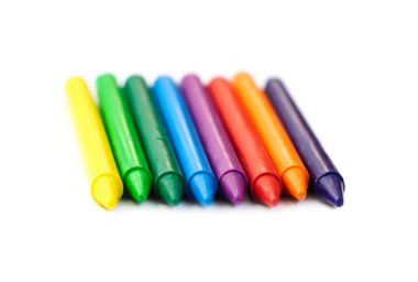 Multi-colored wax crayons clipart