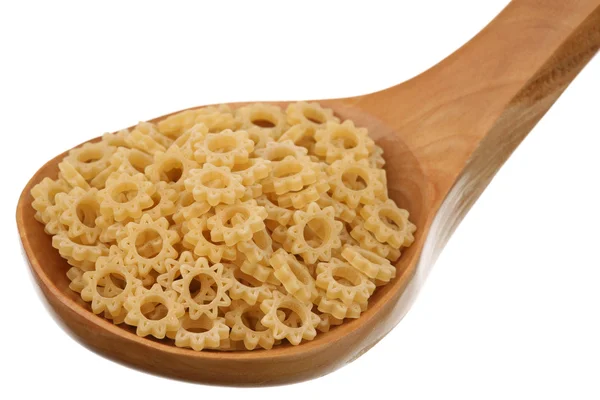 Macaroni in a wooden spoon — Stock Photo, Image