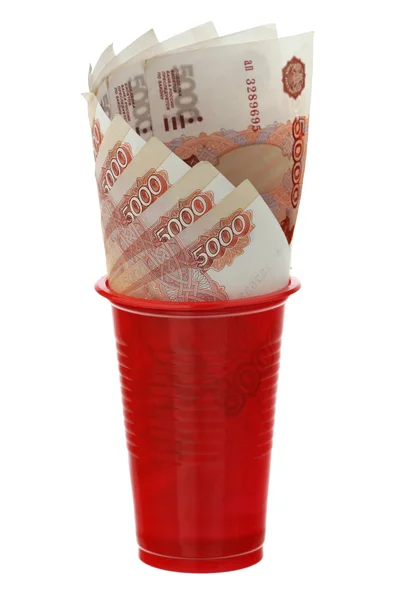 Denominations in a red glass — Stock Photo, Image