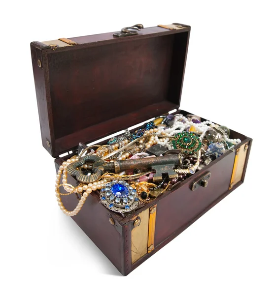 Treasure chest with valuables and key — Stock Photo, Image
