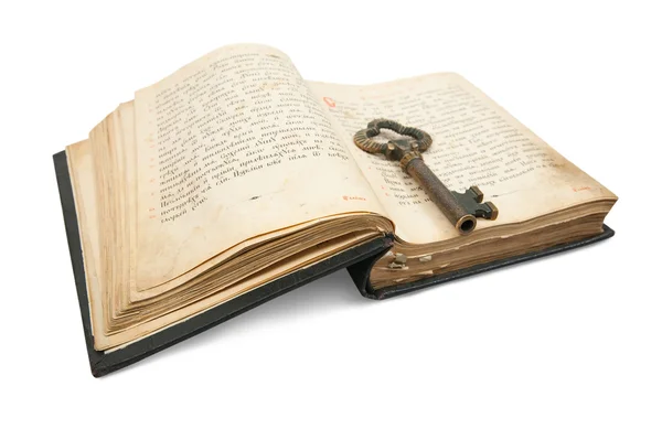 Key placed on vintage book — Stock Photo, Image