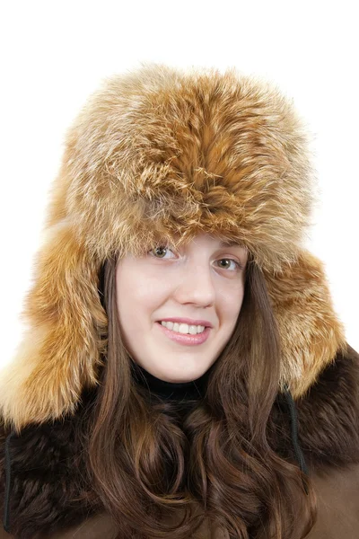 Porträtt av flicka i fox cap — Stockfoto
