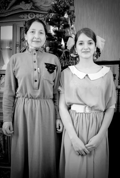 Vintage photo of daughter with mother — Stock Photo, Image