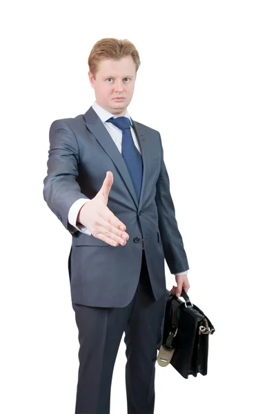 Empresário oferecendo um aperto de mão — Fotografia de Stock